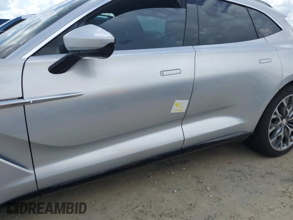 2021 Aston Martin DBX z VIN SCFVUJAW4MTV03930, wystawiony jako Copart lot #73946614 z przebiegiem Nie podano mil oraz Nie do naprawy. Historia ofert i sprzedaży dostępna na DreamBid. Obrazek 13.
