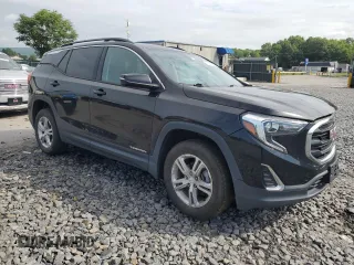 2019 GMC Terrain SLE with VIN 3GKALTEV0KL310810, listed as a Copart auction lot 63398845 with 56,302 mi miles and Salvage title. Bid and sale history available at DreamBid. Image 4.