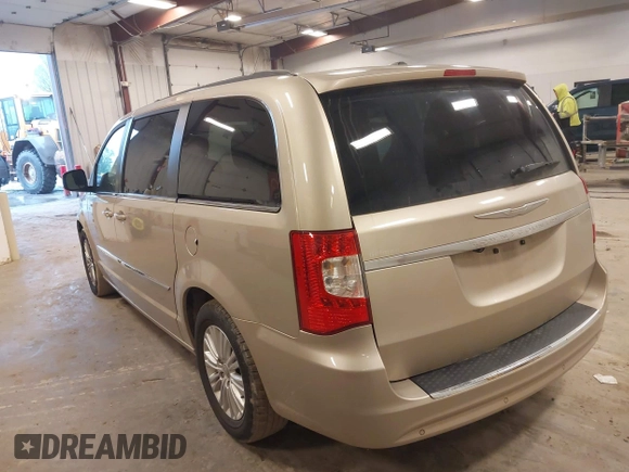 2013 Chrysler Town & Country Touring L with VIN 2C4RC1CG3DR606952, listed as a IAAI auction lot 42189429 with 145,654 mi miles and . Bid and sale history available at DreamBid. Image 3.