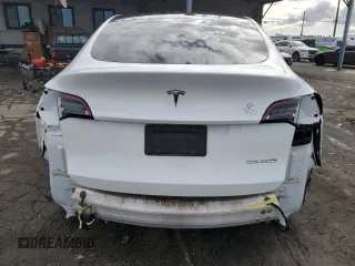 2021 Tesla Model Y Performance with VIN 5YJYGDEF4MF201815, listed as a Copart auction lot 42453075 with 76,888 mi miles and Salvage Title. Bid and sale history available at DreamBid. Image 6.