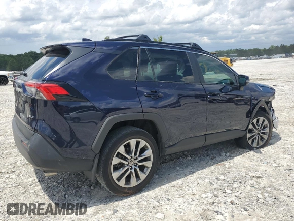 2022 Toyota RAV4 XLE Premium with VIN 2T3C1RFV5NW225650, listed as a Copart auction lot 61301165 with 36,969 mi miles and Salvage title. Bid and sale history available at DreamBid. Image 3.