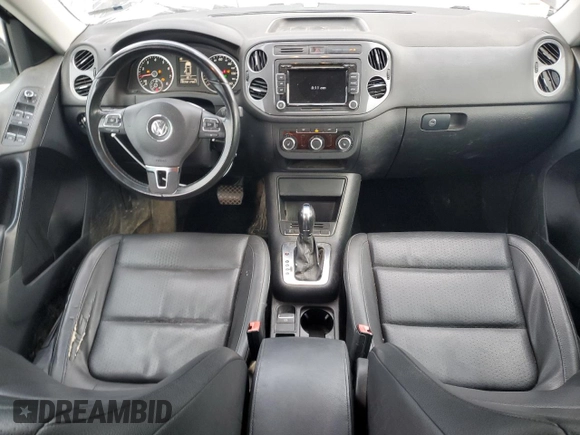 2012 Volkswagen Tiguan SE z VIN WVGAV7AXXCW531875, wystawiony jako Copart lot #82137824 z przebiegiem 147 210 mil mil oraz Tytuł czysty. Historia ofert i sprzedaży dostępna na DreamBid. Obrazek 8.