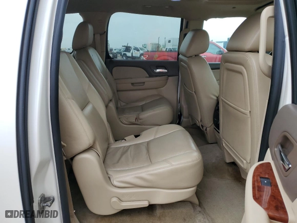 2012 Chevrolet Suburban LTZ with VIN 1GNSCKE02CR199645, listed as a Copart auction lot 47209145 with 128,454 mi miles and Salvage Title. Bid and sale history available at carsss.com. Image 12.