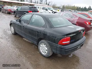 1997 Dodge Neon with VIN 1B3ES27C3VD261832, listed as a IAAI auction lot 41964028 with 220,237 mi miles. Bid and sale history available at carsss.com. Image 3.
