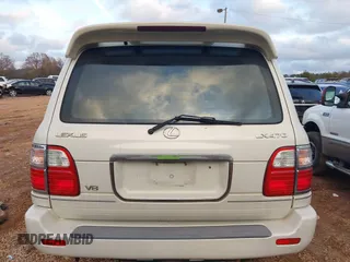 2000 Lexus LX 470 z VIN JT6HT00W9Y0103225, wystawiony jako IAAI lot #41148826 z przebiegiem 270 351 mil mil oraz . Historia ofert i sprzedaży dostępna na DreamBid. Obrazek 16.
