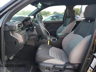 2024 Toyota Tacoma SR5 z VIN 3TYKB5FN9RT000743, wystawiony jako Copart lot #55725665 z przebiegiem 12 070 mil mil oraz Szkoda całkowita • Salvage title. Historia ofert i sprzedaży dostępna na DreamBid. Obrazek 7.