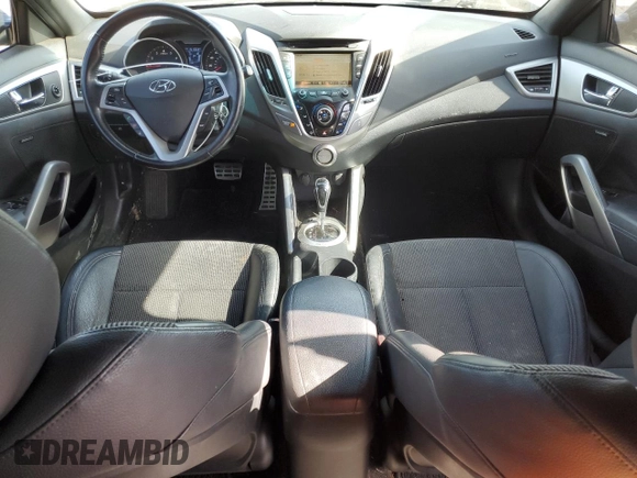 2016 Hyundai Veloster z VIN KMHTC6AD1GU293530, wystawiony jako Copart lot #53137985 z przebiegiem 151 003 mil mil oraz Szkody całkowita. Historia ofert i sprzedaży dostępna na DreamBid. Obrazek 8.