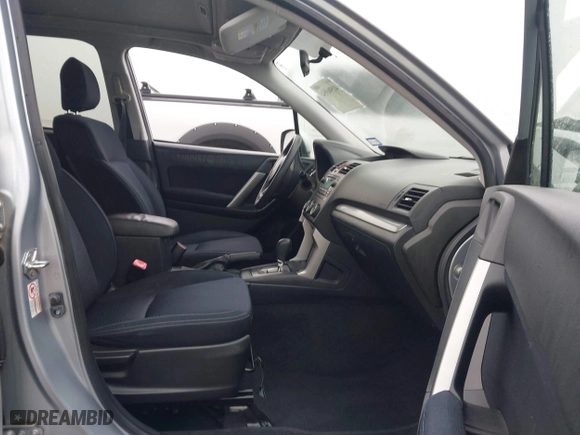 2015 Subaru Forester 2.5i Premium with VIN JF2SJADC2FH830877, listed as a IAAI auction lot 41594954 with 128,984 mi miles. Bid and sale history available at carsss.com. Image 5.