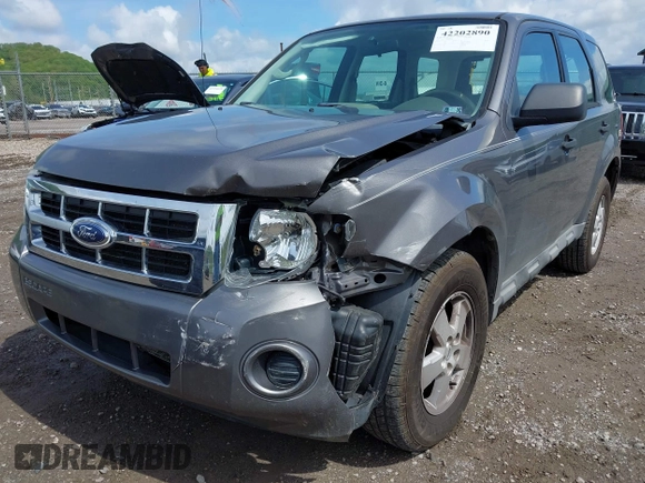 2009 Ford Escape XLS z VIN 1FMCU02709KC11692, wystawiony jako IAAI lot #42202890 z przebiegiem 155 243 mil mil oraz . Historia ofert i sprzedaży dostępna na DreamBid. Obrazek 6.