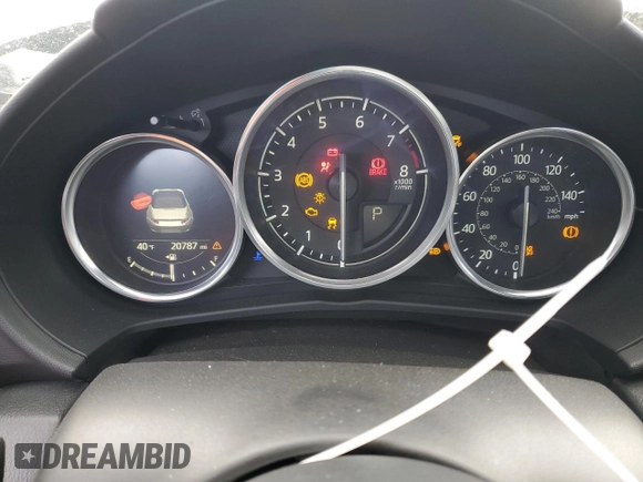 2021 Mazda MX-5 Miata Grand Touring with VIN JM1NDAD73M0451162, listed as a Copart auction lot 42644335 with 20,787 mi miles and Salvage title. Bid and sale history available at DreamBid. Image 9.