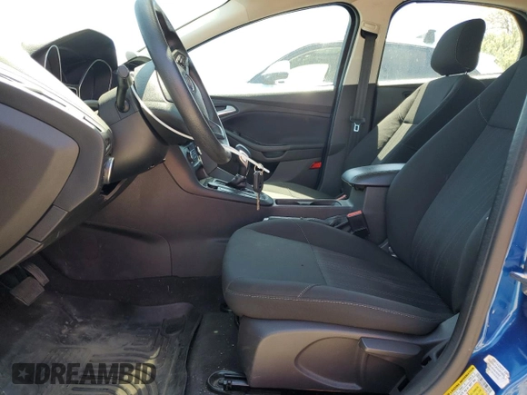 2018 Ford Focus SE z VIN 1FADP3FE1JL246725, wystawiony jako Copart lot #57913225 z przebiegiem 52 247 mil mil oraz Czysty tytuł • Clean title. Historia ofert i sprzedaży dostępna na DreamBid. Obrazek 7.