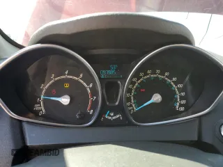 2014 Ford Fiesta Titanium z VIN 3FADP4FJ0EM156814, wystawiony jako Copart lot #52028435 z przebiegiem 97 985 mil mil oraz Szkoda całkowita • Salvage title. Historia ofert i sprzedaży dostępna na DreamBid. Obrazek 9.