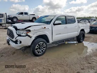 2023 Toyota Tacoma SR5 z VIN 3TMAZ5CN2PM217085, wystawiony jako Copart lot #61425285 z przebiegiem 7 389 mil mil oraz Szkoda całkowita • Salvage title. Historia ofert i sprzedaży dostępna na DreamBid. Obrazek 1.