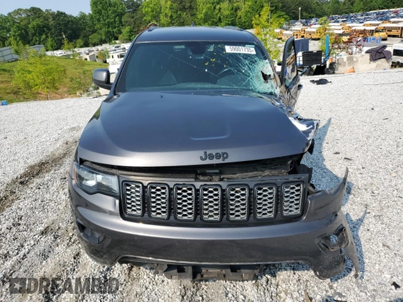 2018 Jeep Grand Cherokee Altitude with VIN 1C4RJEAG4JC145023, listed as a Copart auction lot 59001735 with 127,627 mi miles and Salvage title. Bid and sale history available at DreamBid. Image 5.