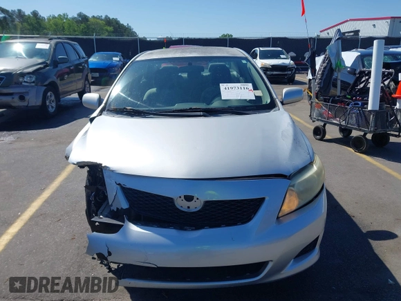 2009 Toyota Corolla with VIN 1NXBU40E99Z100681, listed as a IAAI auction lot 41973116 with 119,744 mi miles. Bid and sale history available at carsss.com. Image 12.