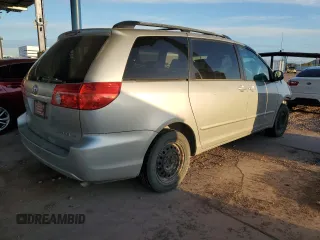 2010 Toyota Sienna CE with VIN 5TDKK4CC6AS329753, listed as a Copart auction lot 54374515 with 144,654 mi miles and Salvage Title. Bid and sale history available at DreamBid. Image 3.