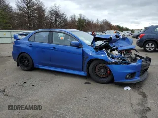 2015 Mitsubishi Lancer Evolution GSR z VIN JA32W8FV7FU023106, wystawiony jako Copart lot #40867084 z przebiegiem 103 964 mil mil oraz Szkody całkowita. Historia ofert i sprzedaży dostępna na DreamBid. Obrazek 4.