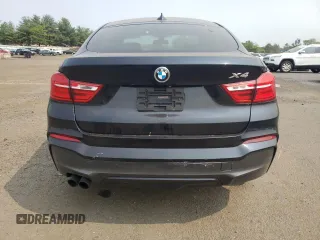 2015 BMW X4 xDrive35i with VIN 5UXXW5C59F0E87517, listed as a Copart auction lot 59604445 with 185,064 mi miles and Salvage title. Bid and sale history available at DreamBid. Image 6.