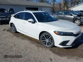 2023 Honda Civic Touring z VIN 2HGFE1F98PH312792, wystawiony jako IAAI lot #40819408 z przebiegiem 14 525 mil mil oraz . Historia ofert i sprzedaży dostępna na DreamBid. Obrazek 1.