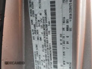 2009 Ford Econoline Cargo Commercial with VIN 1FTNE14W69DA78011, listed as a Copart auction lot 52593765 with 29,787 mi miles and Salvage Title. Bid and sale history available at DreamBid. Image 14.
