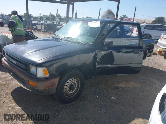 1989 Toyota Pickup DX z VIN JT4RN81P0K0029116, wystawiony jako IAAI lot #42474777 z przebiegiem 234 987 mil mil oraz . Historia ofert i sprzedaży dostępna na DreamBid. Obrazek 17.