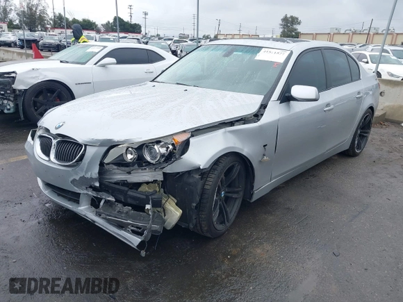 2007 BMW 5 Series 530i with VIN WBANE73507CM46579, listed as a IAAI auction lot 41511577 with 168,904 mi miles. Bid and sale history available at carsss.com. Image 2.