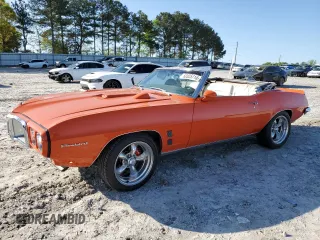 1969 Pontiac Firebird z VIN 223679U130800, wystawiony jako Copart lot #52325715 z przebiegiem 545 118 mil mil oraz Szkody całkowita. Historia ofert i sprzedaży dostępna na DreamBid. Obrazek 1.