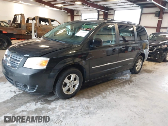 2010 Dodge Grand Caravan SXT with VIN 2D4RN5D19AR433481, listed as a IAAI auction lot 42123049 with 134,882 mi miles and . Bid and sale history available at DreamBid. Image 2.