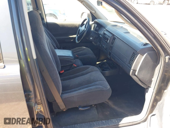 2002 Dodge Dakota SLT z VIN 1B7HG48NX2S623588, wystawiony jako IAAI lot #41793068 z przebiegiem 213 159 mil mil oraz . Historia ofert i sprzedaży dostępna na DreamBid. Obrazek 5.