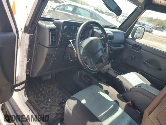 2003 Jeep Wrangler Rubicon z VIN 1J4FA69S73P333199, wystawiony jako Copart lot #50602615 z przebiegiem 133 254 mil mil oraz Szkoda całkowita • Salvage title. Historia ofert i sprzedaży dostępna na DreamBid. Obrazek 8.