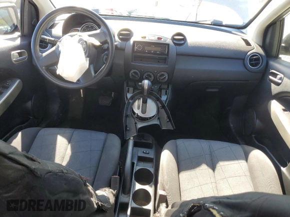 2012 Mazda 2 Sport with VIN JM1DE1KZ2C0149132, listed as a Copart auction lot 45177385 with 146,966 mi miles and Salvage Title. Bid and sale history available at DreamBid. Image 8.