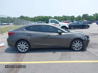 2017 Mazda 3 Touring with VIN 3MZBN1V74HM142735, listed as a IAAI auction lot 42395462 with 137,543 mi miles and . Bid and sale history available at DreamBid. Image 13.
