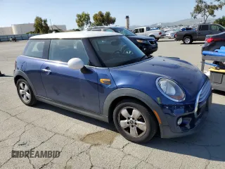 2014 MINI Hardtop with VIN WMWXM5C52ET932677, listed as a Copart auction lot 53486865 with 189,039 mi miles and Salvage title. Bid and sale history available at DreamBid. Image 4.