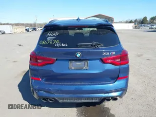 2021 BMW X3 M z VIN 5YMTS0C06M9F45134, wystawiony jako IAAI lot #41867376 z przebiegiem 35 237 mil mil oraz . Historia ofert i sprzedaży dostępna na DreamBid. Obrazek 16.