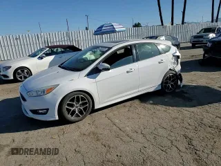 2015 Ford Focus SE with VIN 1FADP3K29FL334599, listed as a Copart auction lot 46926475 with 127,537 mi miles and Salvage Title. Bid and sale history available at DreamBid. Image 10.