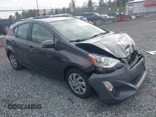 2015 Toyota Prius One z VIN JTDKDTB32F1575905, wystawiony jako IAAI lot #42152447 z przebiegiem 141 061 mil mil oraz . Historia ofert i sprzedaży dostępna na DreamBid. Obrazek 1.