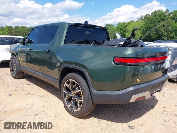2023 Rivian R1T Adventure z VIN 7FCTGAAAXPN019894, wystawiony jako IAAI lot #42168226 z przebiegiem 23 380 mil mil oraz . Historia ofert i sprzedaży dostępna na DreamBid. Obrazek 3.