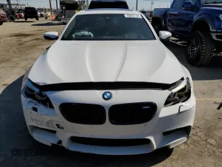 2014 BMW M5 with VIN WBSFV9C57ED097570, listed as a Copart auction lot 88571785 with 100,391 mi miles and Salvage Title. Bid and sale history available at carsss.com. Image 5.