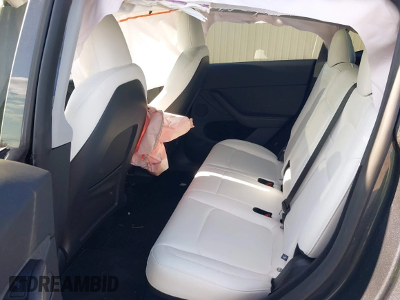 2024 Tesla Model Y Long Range with VIN 7SAYGDEE3RA321734, listed as a IAAI auction lot 40825378 with 4,440 mi miles and . Bid and sale history available at DreamBid. Image 8.