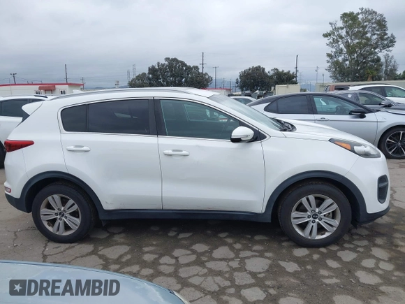 2018 Kia Sportage LX with VIN KNDPM3AC1J7413227, listed as a IAAI auction lot 42188566 with 77,897 mi miles and . Bid and sale history available at carsss.com. Image 13.