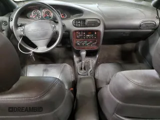 1999 Chrysler Cirrus LXi z VIN 1C3EJ56H4XN528008, wystawiony jako Copart lot #80166314 z przebiegiem 127 767 mil mil oraz Tytuł czysty. Historia ofert i sprzedaży dostępna na DreamBid. Obrazek 8.