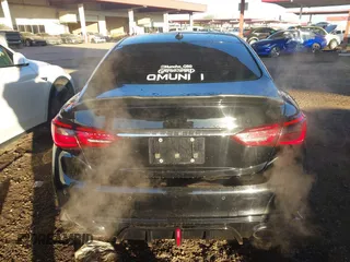 2018 Infiniti Q50 Luxe with VIN JN1EV7AP7JM590173, listed as a IAAI auction lot 41298515 with 99,415 mi miles and . Bid and sale history available at DreamBid. Image 16.
