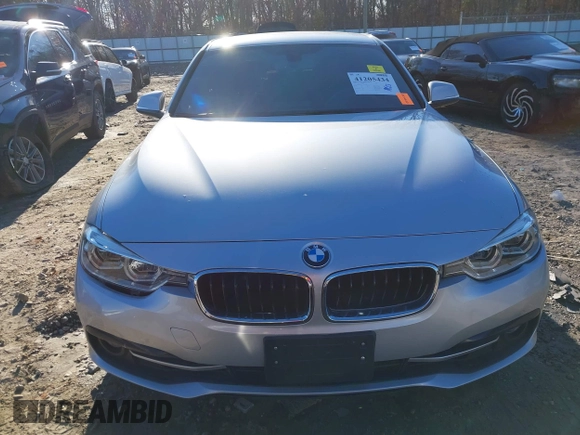 2018 BMW 3 Series 330i with VIN WBA8B9G58JNU97318, listed as a IAAI auction lot 41205434 with 62,582 mi miles and . Bid and sale history available at DreamBid. Image 12.