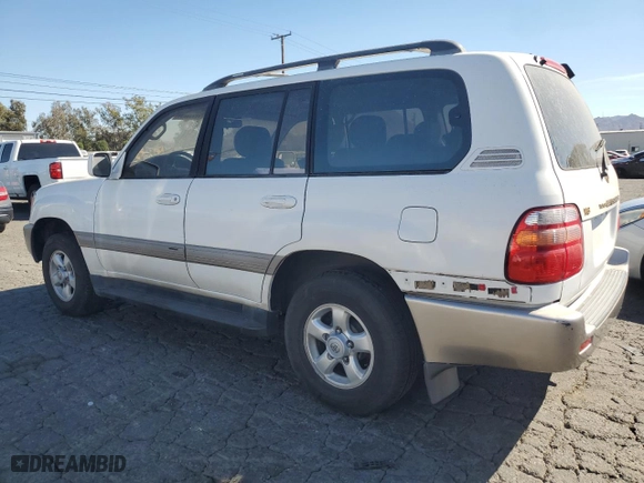 1999 Toyota Land Cruiser with VIN JT3HT05J0X0059222, listed as a Copart auction lot 77713294 with 406,869 mi miles and Clean Title. Bid and sale history available at carsss.com. Image 2.