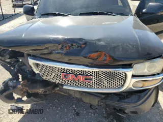 2005 GMC Sierra Denali z VIN 2GTEK63NX51254997, wystawiony jako Copart lot #58178244 z przebiegiem 180 531 mil mil oraz Szkody całkowita. Historia ofert i sprzedaży dostępna na DreamBid. Obrazek 11.