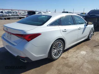 2019 Toyota Avalon XLE with VIN 4T1BZ1FB8KU030044, listed as a IAAI auction lot 41436242 with 56,261 mi miles and . Bid and sale history available at carsss.com. Image 4.