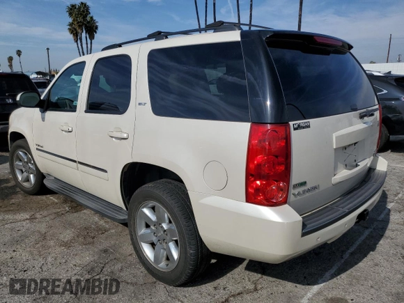 2011 GMC Yukon SLT with VIN 1GKS1CE05BR400428, listed as a Copart auction lot 43606335 with 0 mi miles and Salvage Title. Bid and sale history available at carsss.com. Image 2.