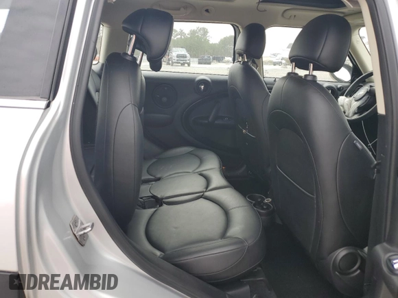 2016 MINI Countryman with VIN WMWZB3C50GWR48610, listed as a Copart auction lot 44028035 with 69,801 mi miles and Salvage title. Bid and sale history available at DreamBid. Image 11.