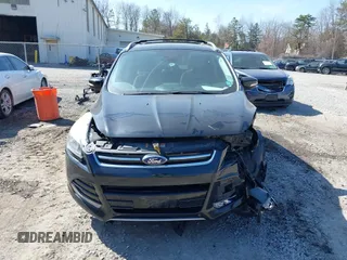 2014 Ford Escape Titanium with VIN 1FMCU9JX2EUA96338, listed as a IAAI auction lot 41806850 with 127,745 mi miles. Bid and sale history available at carsss.com. Image 12.