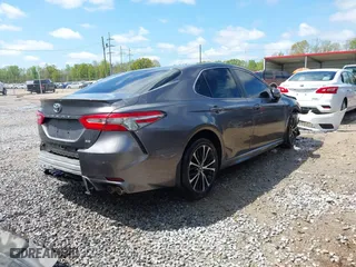 2018 Toyota Camry LE with VIN 4T1B11HK2JU578575, listed as a IAAI auction lot 41850389 with 213,235 mi miles. Bid and sale history available at carsss.com. Image 4.
